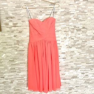 Coral knee-length bridesmaid dress